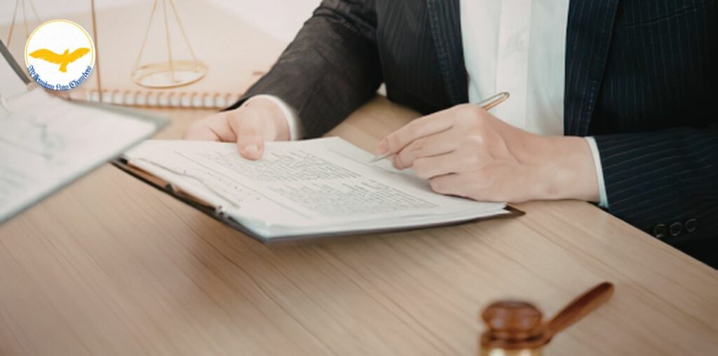 algary criminal defence lawyer PM Menon Parakkal consulting with a client at Millennium Law Chambers