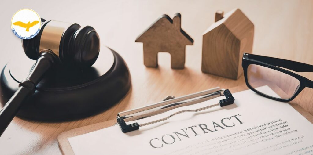 Calgary Real Estate Lawyer reviewing property documents at Millennium Law Chambers
