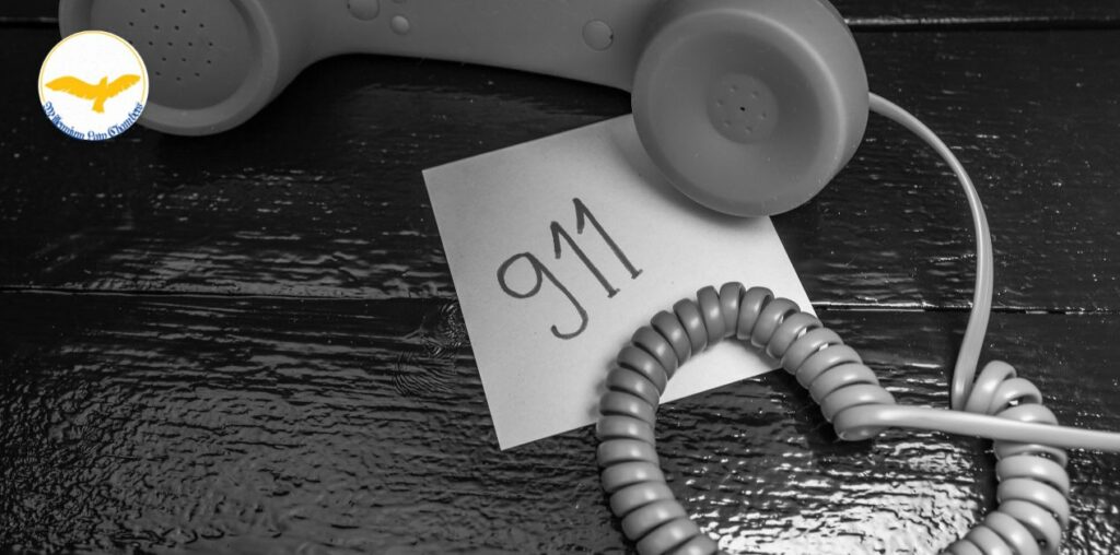 Call 911. After a car accident in calgary